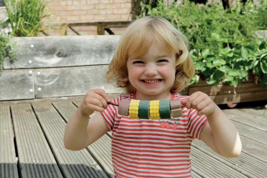 Yellow Door Maths Outdoors | Threading Kebabs Sensory Play Stones