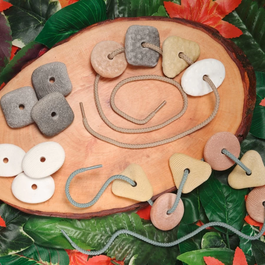 Yellow Door Maths Outdoors | Threading Pebbles